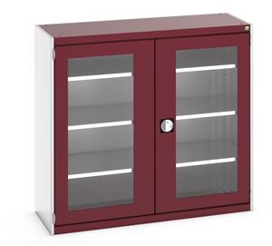 40014056.** Bott Cubio Window Door Cupboard with lockable doors and clear perspex windows. External dimensions are 1300mm wide x 525mm deep x 1200mm high and the cupboard is supplied with 3 x 160kg capacity shelves....